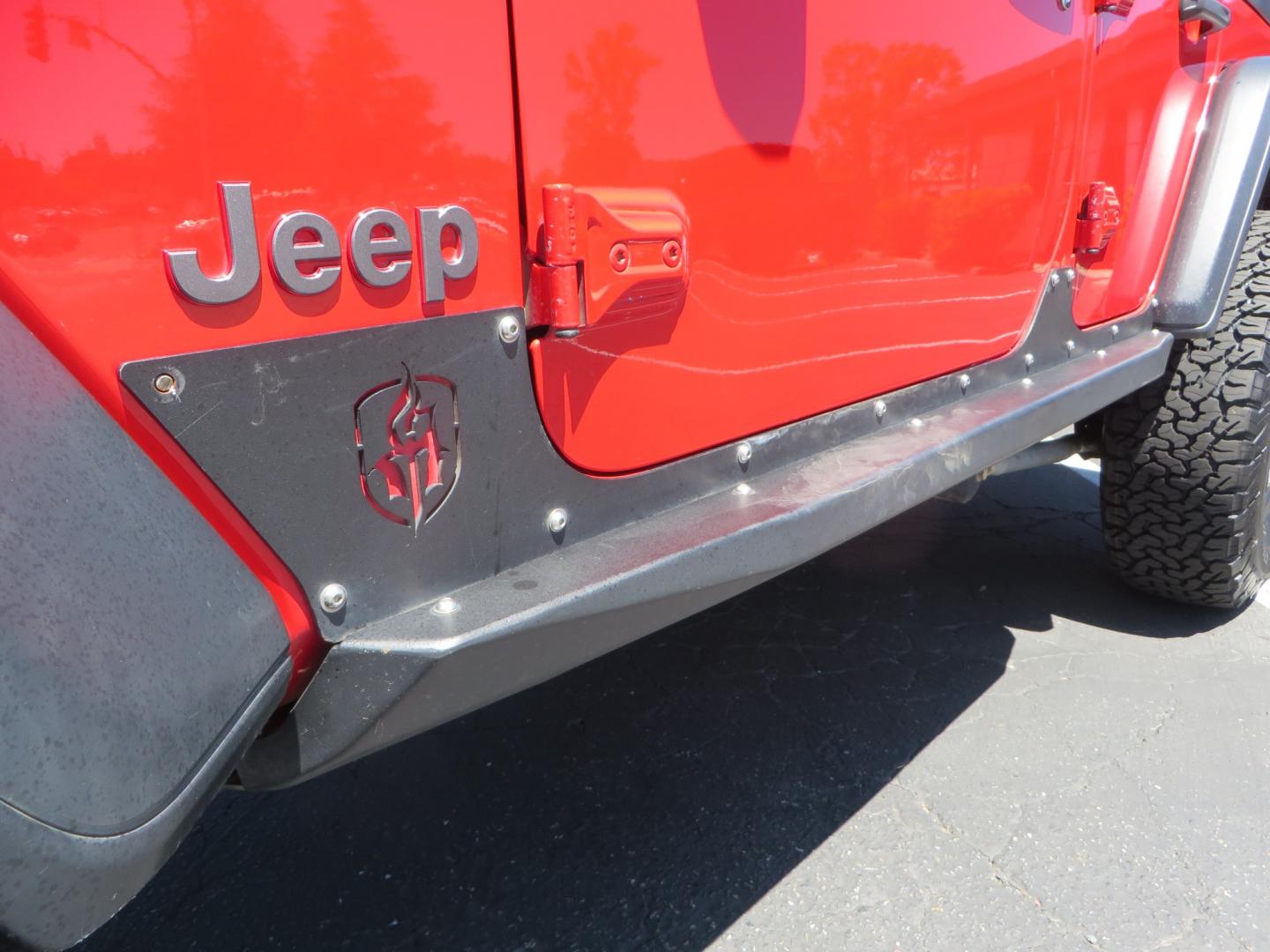 2019 Red /Black Jeep Wrangler Unlimited Rubicon (1C4HJXFN7KW) with an 2.0L L4 DOHC 16V TURBO engine, automatic transmission, located at 2630 Grass Valley Highway, Auburn, CA, 95603, (530) 508-5100, 38.937893, -121.095482 - Rubicon JL ready for all of your offroad adventures. This Jeep is sitting on a Rubicon Express lift kit, RE 2.5 Extreme series shocks, 17" Method bead grip wheels, 37" BFG KO2 tires, EVO front bumper, Warn winch, Road Armor rock slliders, and a HD Jeep spare tire carrier. - Photo#12